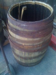 Old whiskey barrel ready to be a chairs and have a new purpose in life.