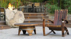 A Wine Barrel Coffee Table & Bistro Chairs in the Garden at Stone Brewery 